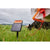 Gallagher S60 solar Fence Energizer connected to grazing wire reel with cow in background