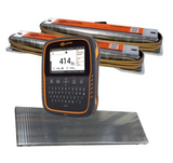 Gallagher TW-3 electronic cattle and livestock scale system with a black and orange casing stands in front of two alleyway load bars on a white background, with a textured metal platform in front of it.