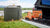 Gallagher water supply kit in front of a liquid storage tank